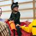 (left) Maureen McDonnell, Canton, leads rider Johanna Lautenbach, 5 of Ypsilanti, around the ring with volunteer Debbie Schlang, New Hudson at the Harold and Kay Peplau Therapeutic Riding Center's Halloween Trick-or-Treat horse ride. (Tanya Moutzalias for AnnArbor.com)